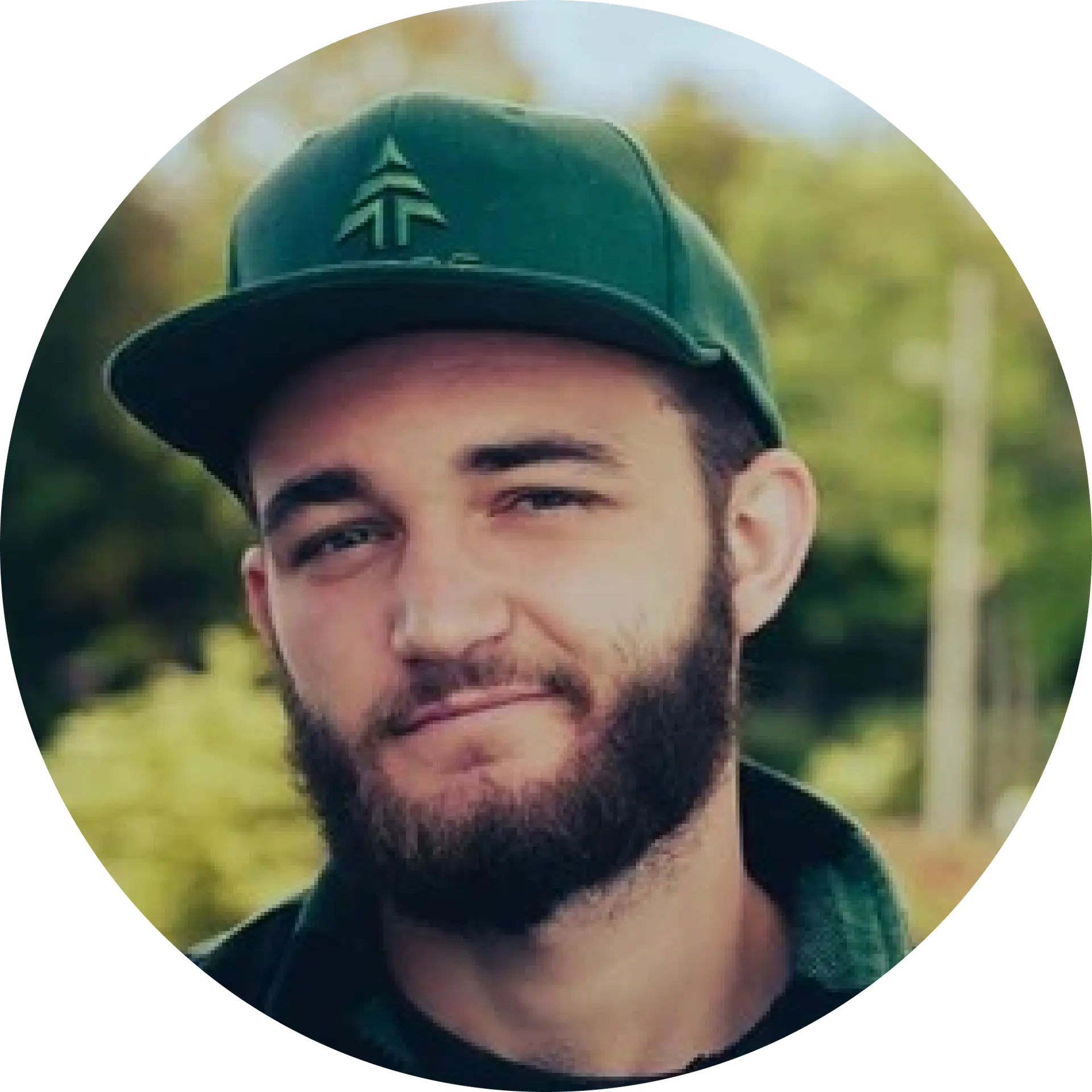 man wearing green cap profile picture