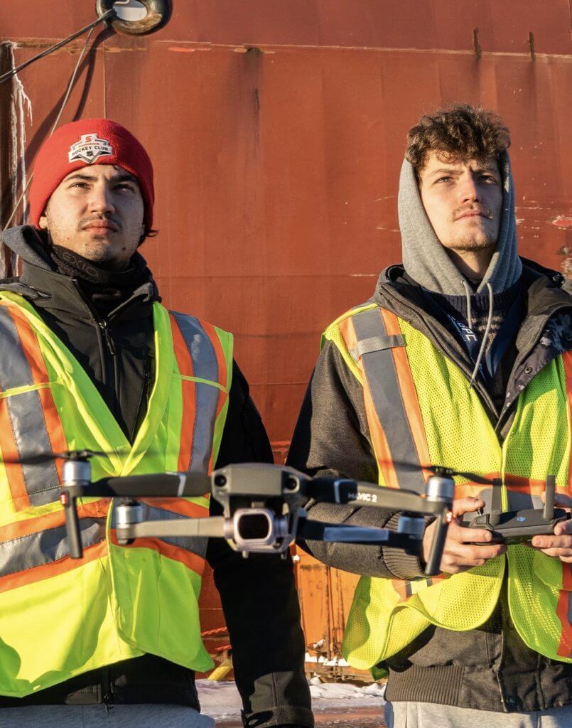 2 person shooting the event with the help of drone