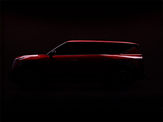 FX Productions Canada A red SUV is shown in profile against a dark background, with minimal lighting highlighting the car's outline—captured in stunning detail by FX Productions Canada, a leading Toronto Video Production company. Toronto Video Production Company