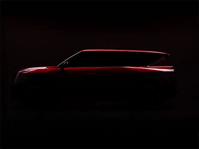 FX Productions Canada A red SUV is shown in profile against a dark background, with minimal lighting highlighting the car's outline—captured in stunning detail by FX Productions Canada, a leading Toronto Video Production company. Toronto Video Production Company