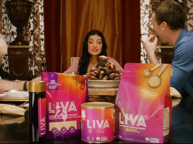 FX Productions Canada Three people sit at a dining table with a large pile of dates, surrounded by packages of LIVA date powder products—showcasing a Toronto Production Company’s work for FX Productions Canada. Toronto Video Production Company