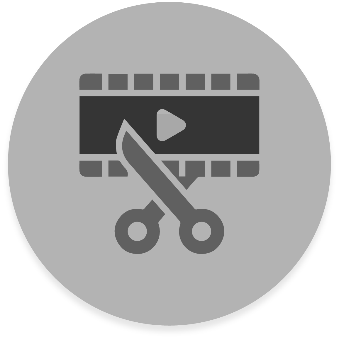 FX Productions Canada Gray circular icon featuring a film strip with a play button and scissors, representing video editing or trimming. Ideal for Toronto Production Company or FX Productions Canada specializing in media content creation. Toronto Video Production Company