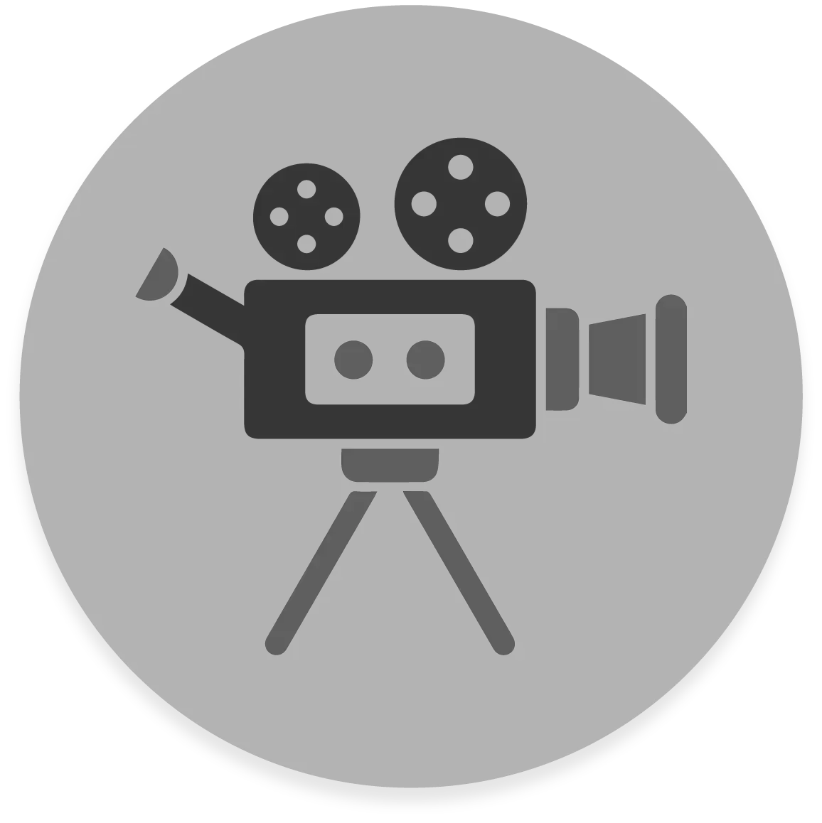 FX Productions Canada Icon of a vintage film camera with two reels on a tripod, displayed in dark gray on a circular background—perfect for representing a Toronto Production Company or FX Productions Canada. Toronto Video Production Company