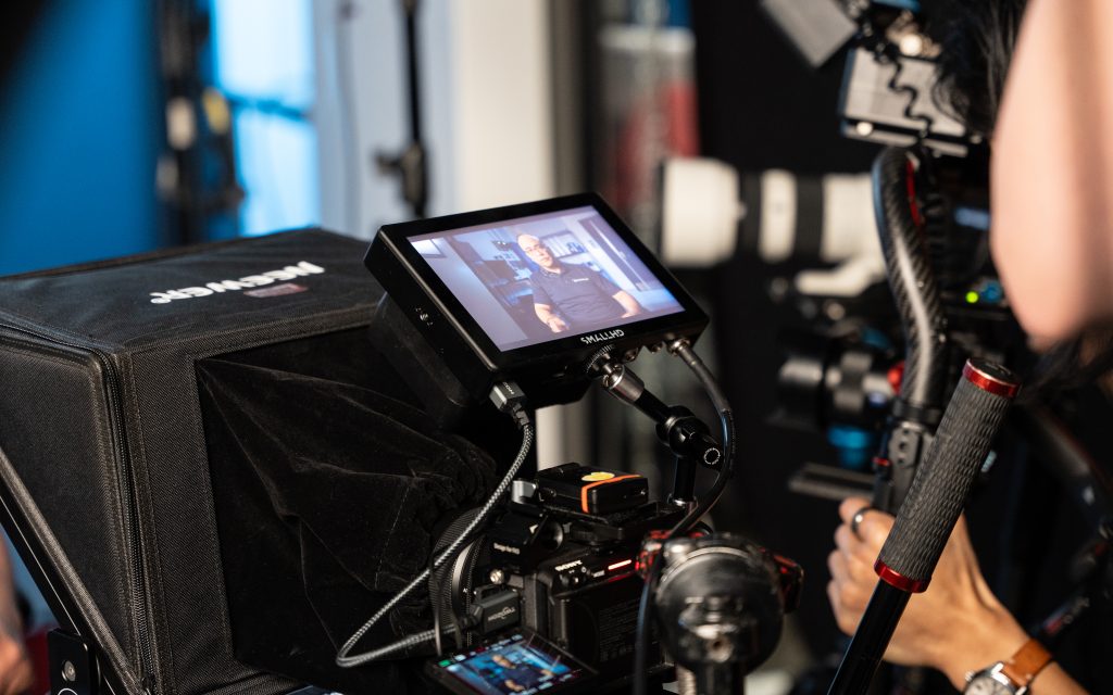 SmallHD on-camera monitor displaying talent on screen during a professional video shoot at FX Productions Canada Toronto