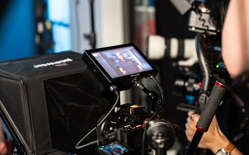 SmallHD on-camera monitor displaying talent on screen during a professional video shoot at FX Productions Canada Toronto