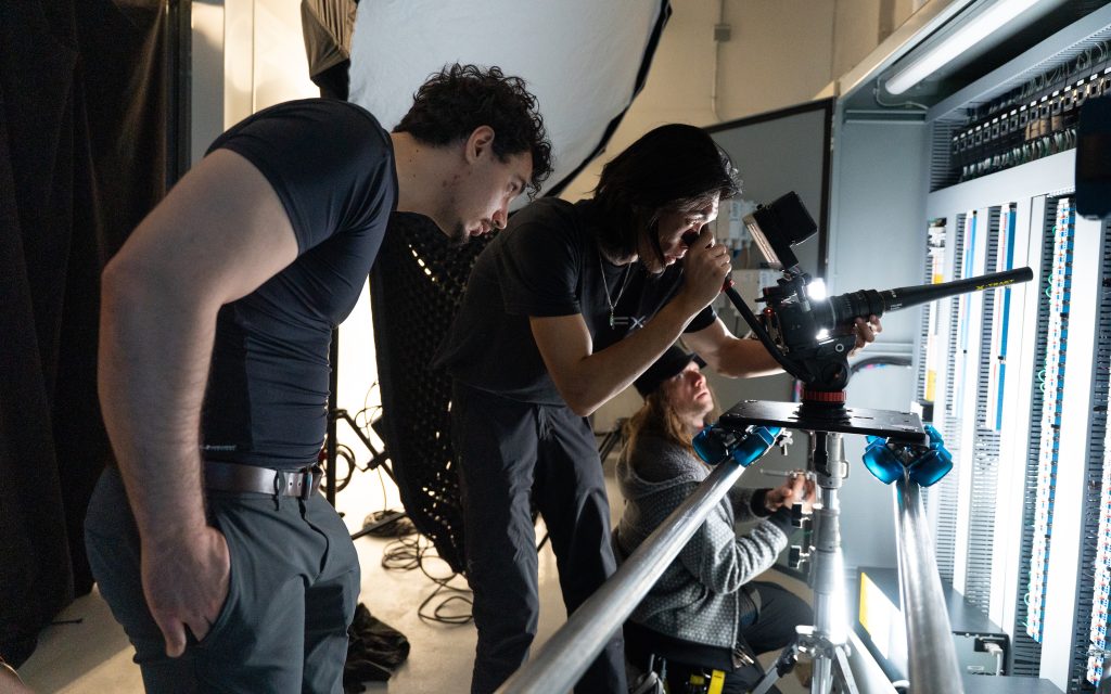 FX Productions Canada crew operating a camera slider rig with softbox lighting during an on-location video production shoot